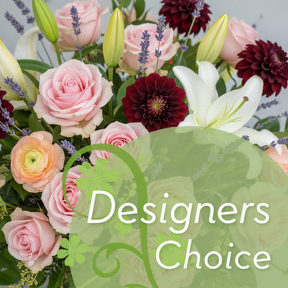 Colorful flowers with a green leaf-shaped label reading 'Designers Choice'.